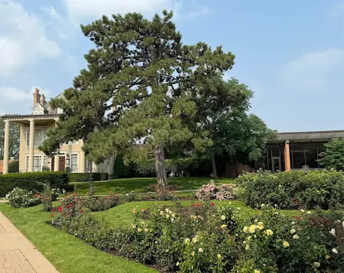 Landscaped gardens and mature trees at Cook Park in Libertyville, Illinois.