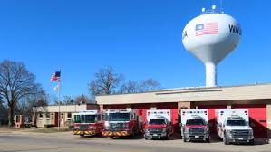 Wauconda Fire Protection District station with emergency vehicles parked outside.